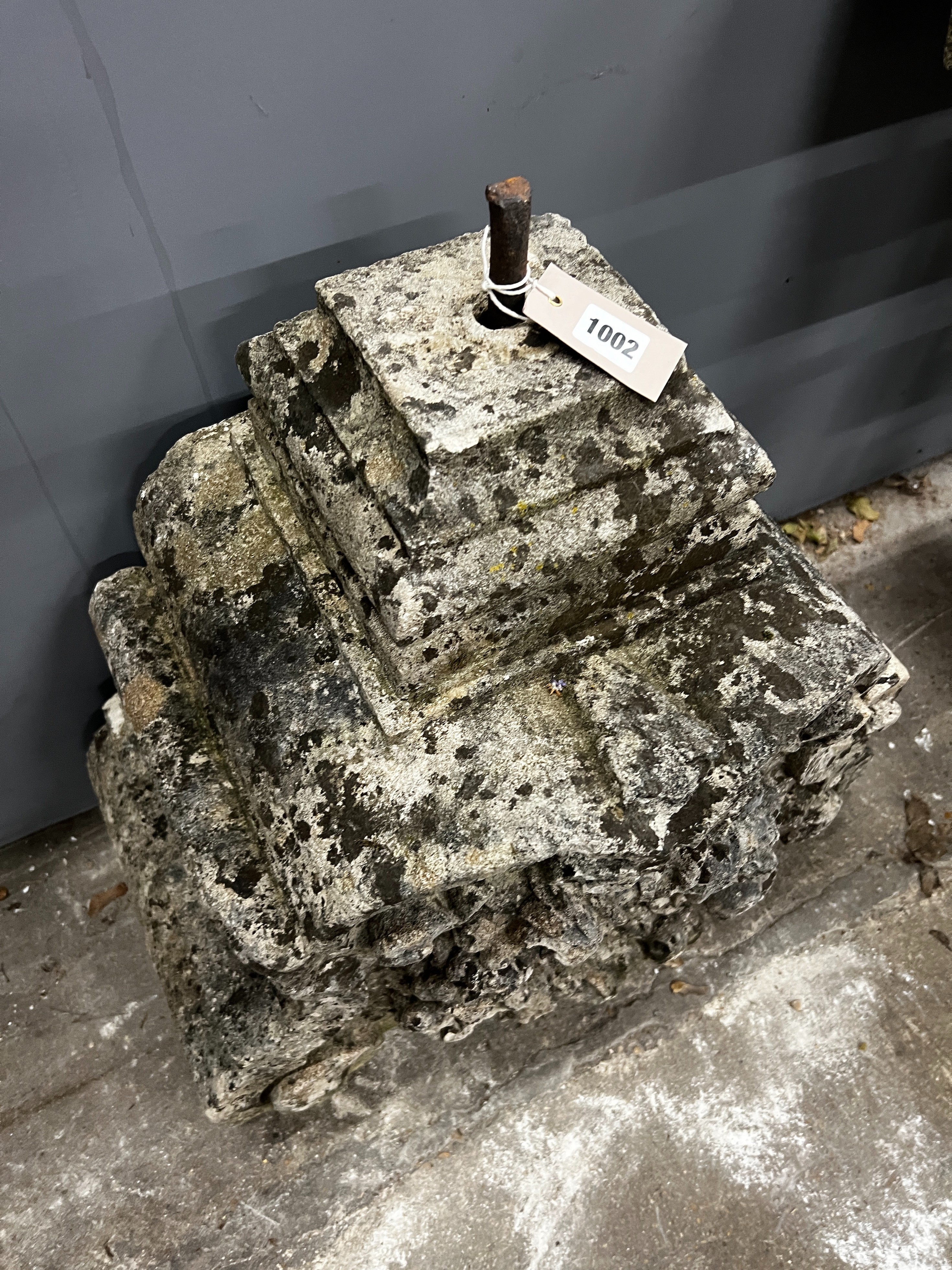 A carved stone corbel, width 60cm, height 60cm